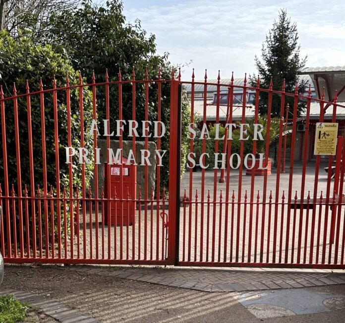 The gates of Alfred Salter Primary School in Rotherhithe, London, decorated with children's artwork. Photo: Matt Brown, CC BY 2.0 via Wikimedia Commons