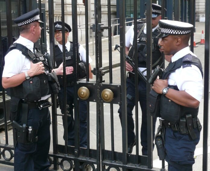 Armed police officers on duty in London (file photo)