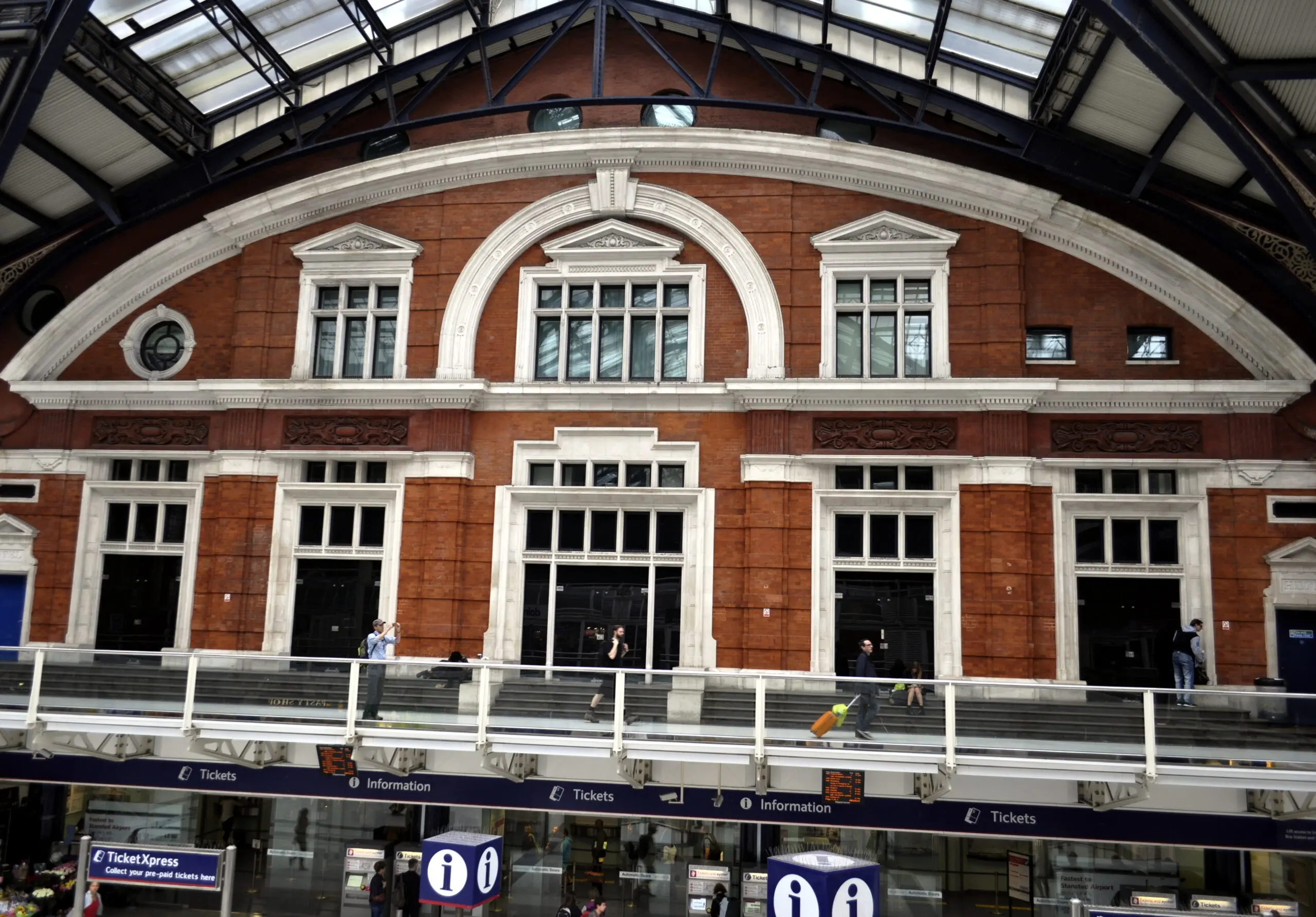 Trains standing at platforms inside London Liverpool Street station