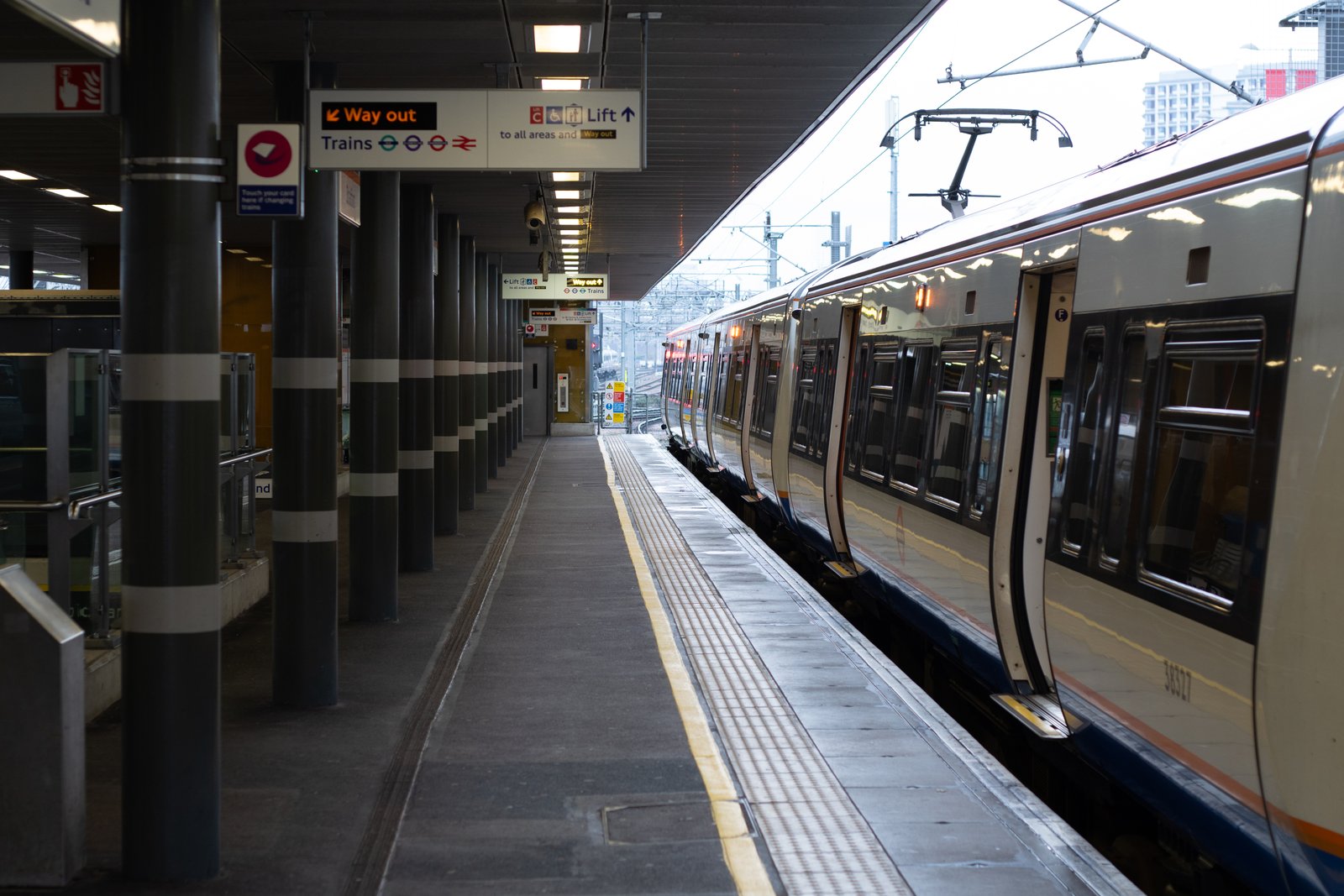 A London Overground train standing at Stratford station