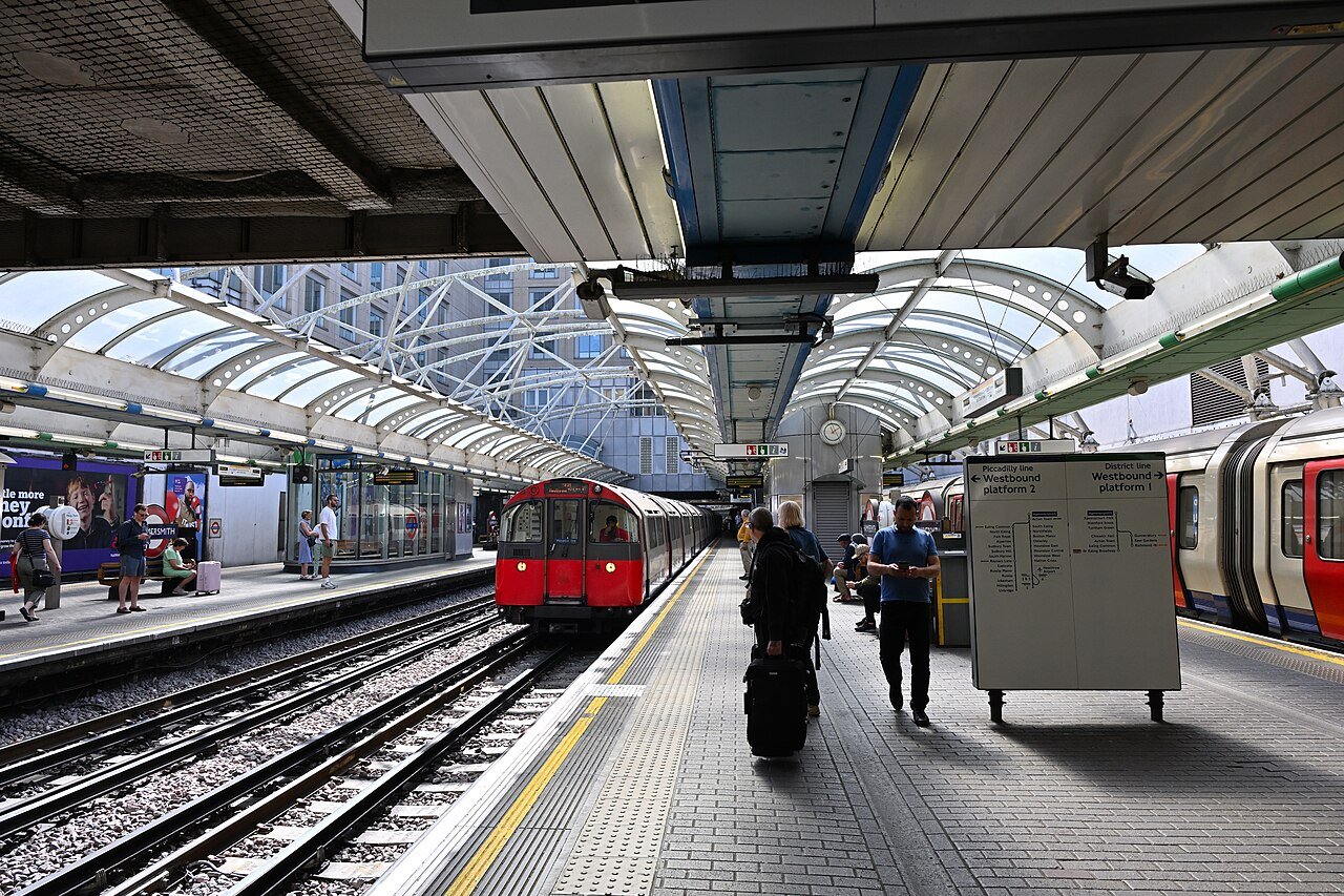 Piccadilly line train arriving at Hammersmith station in west London